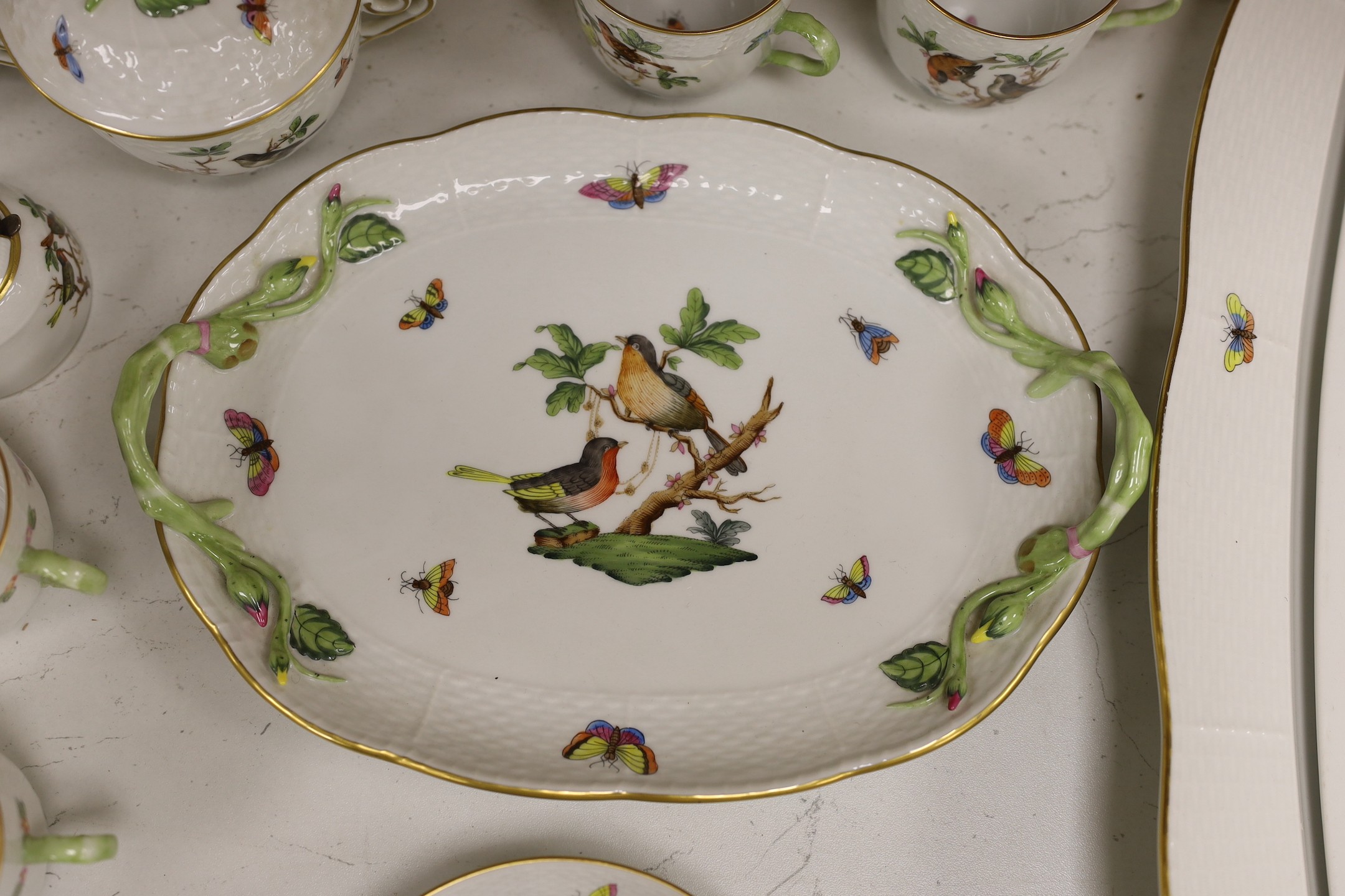 A group of Herend Rothschild Bird pattern coffee, dinner and decorative wares, largest oval fish platter 61 cms wide.